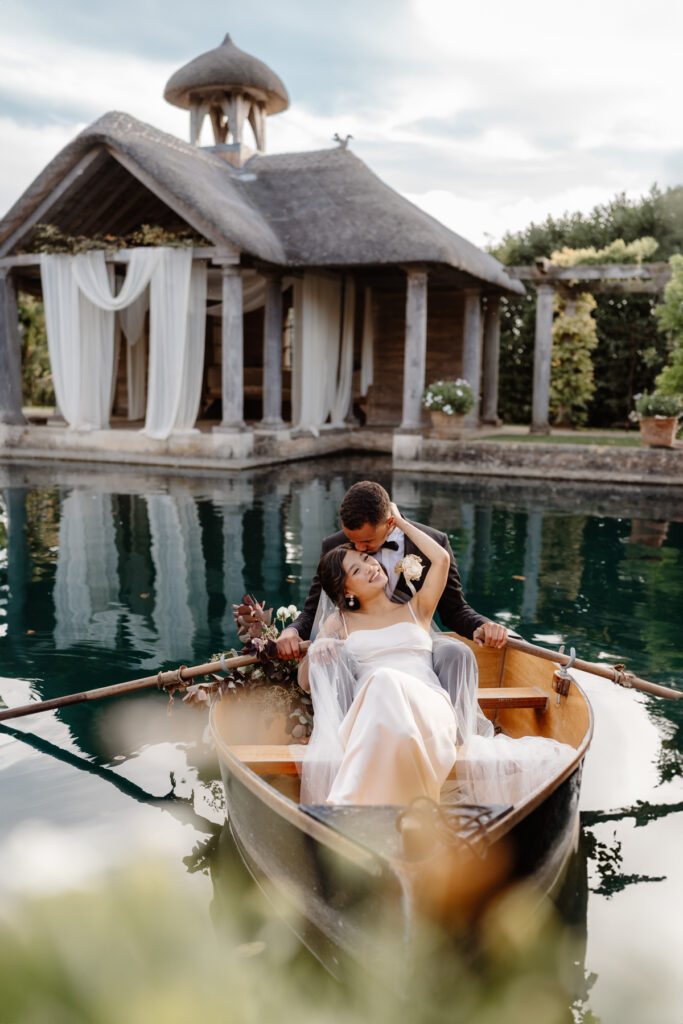 Euridge Manor Wedding Photographer - Couples Portraits on the rowing boat