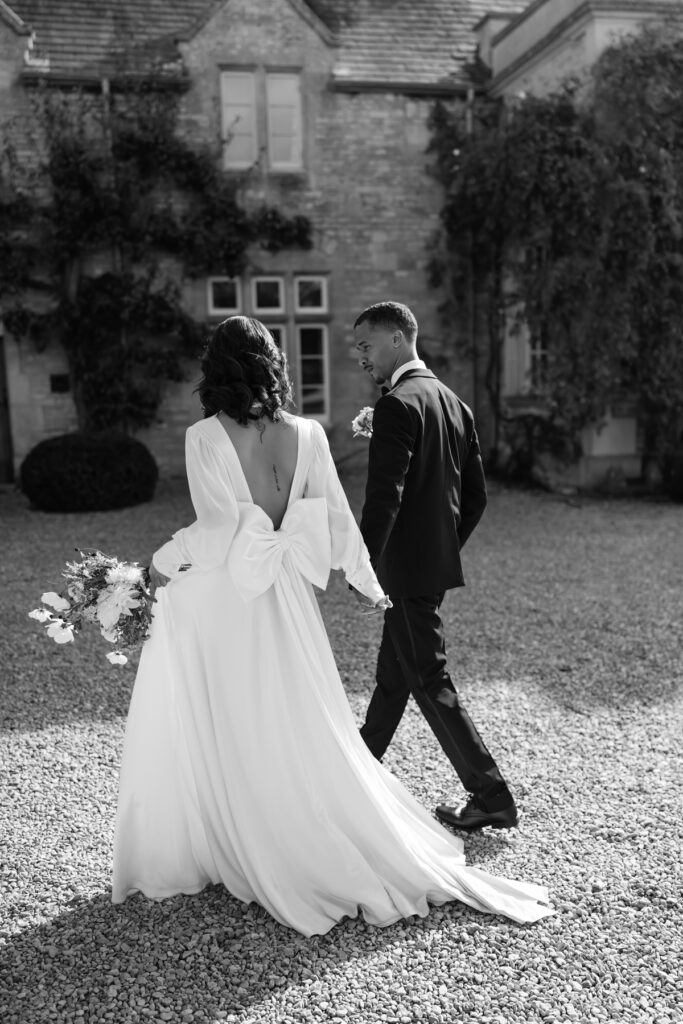 Relaxed couples portraits walking bride and groom