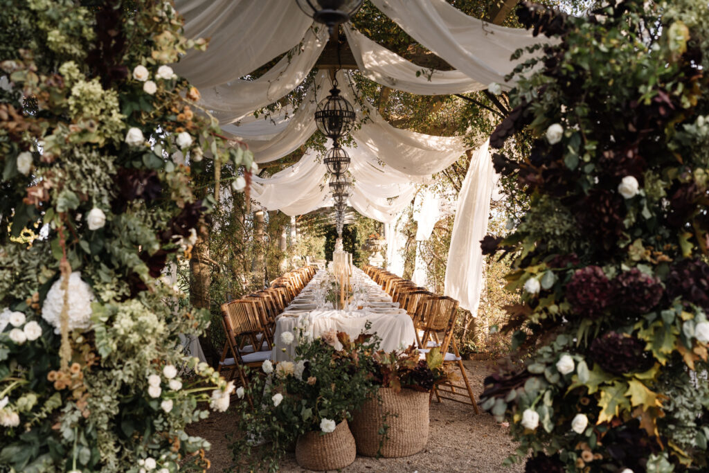 Euridge Manor Luxury Wedding Photographer - pergola alfresco dining table set up UK
