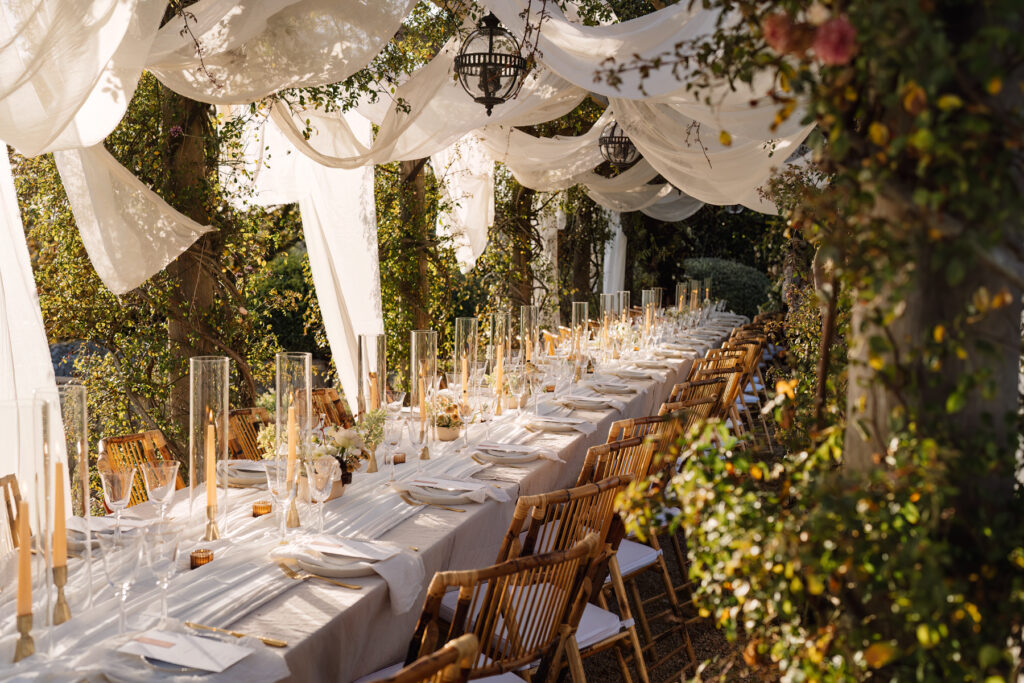 Euridge Manor Luxury Wedding Photographer - pergola alfresco dining table set up UK