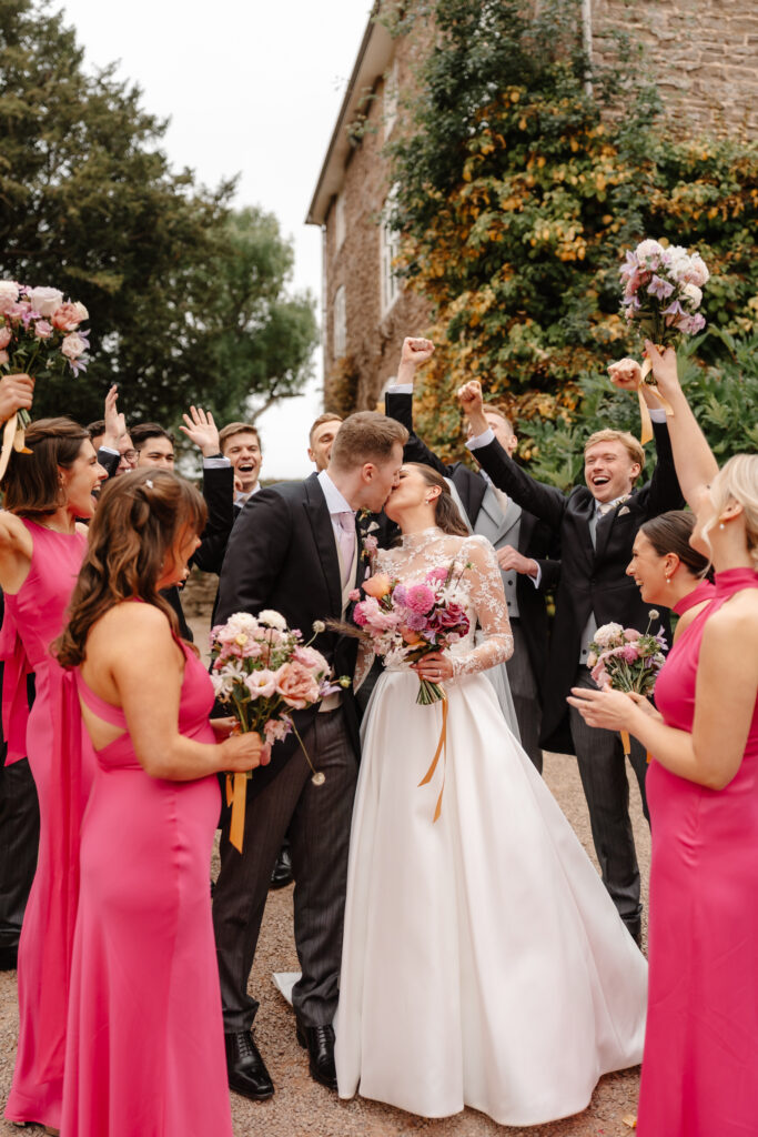 Dewsall Court Wedding Photographer - Bridesmaids in Hot Pink Maids to Measure Dresses