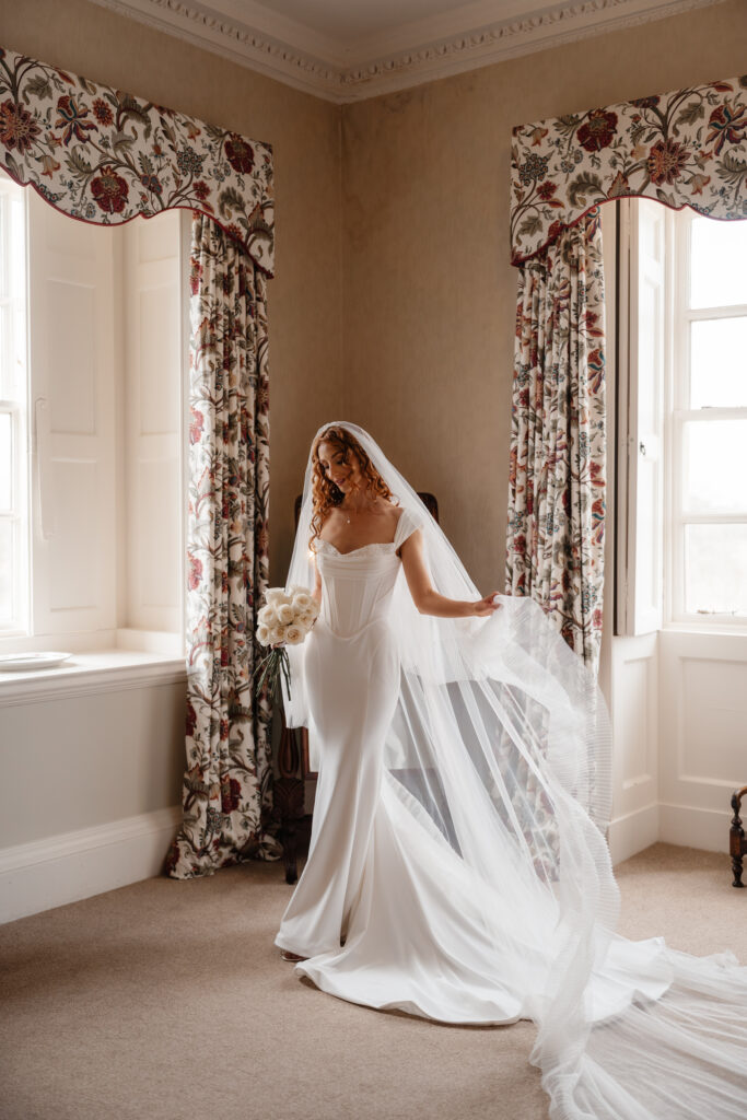 Kirtlington Park Wedding Photographer – Bridal portaits in the bedroom
