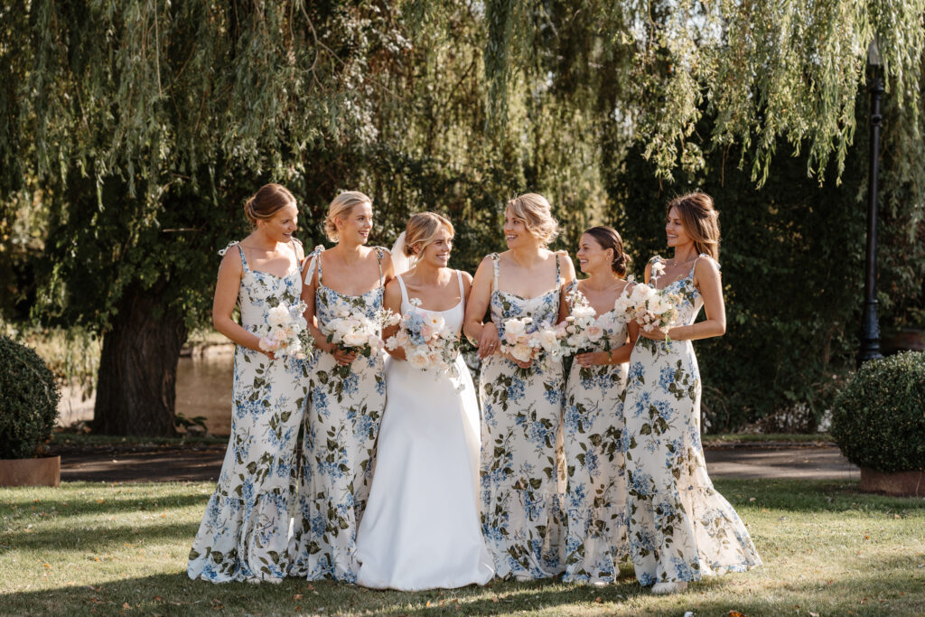 Bridesmaids in Hydrangea Blue floral Reformation dresses